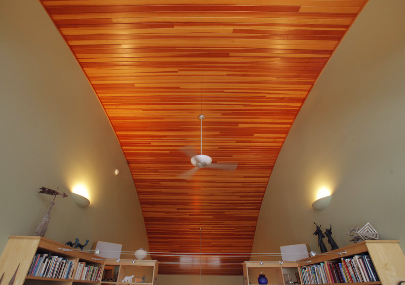 This vaulted ceiling is one of many curves in the home that have earned it the name “The Wave House.”