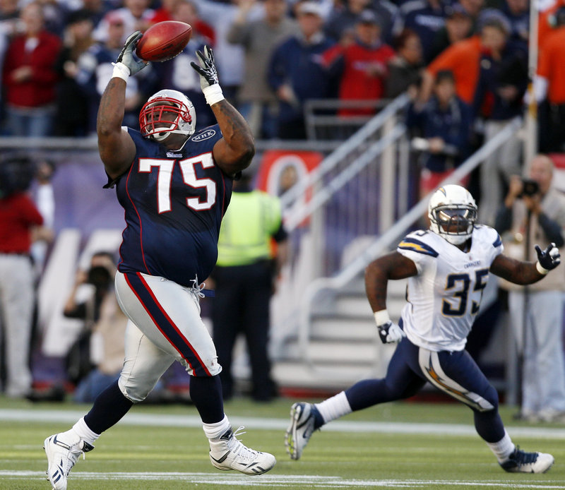 Vince Wilfork intercepts a pass against the Chargers on Sept. 18. Wilfork returned it 28 yards, setting up a field goal in the 35-21 win.