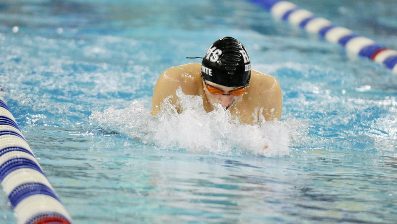 Eric Delmonte of Deering swims the breast stroke on his way to victory in the 200-yard individual medley Friday at the North Southwesterns. Delmonte finished in 1:59.86, winning by six seconds, and also won the 500 freestyle.
