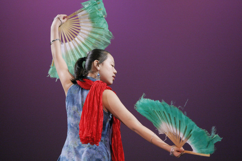 Performances were part of the Chinese New Year celebration Saturday in Westbrook. Above, Emily Zhao dances to “Qing Hua Ci” (“Blue and White Porcelain”). Below, Jia Chase performs the Little Calico Cats dance.