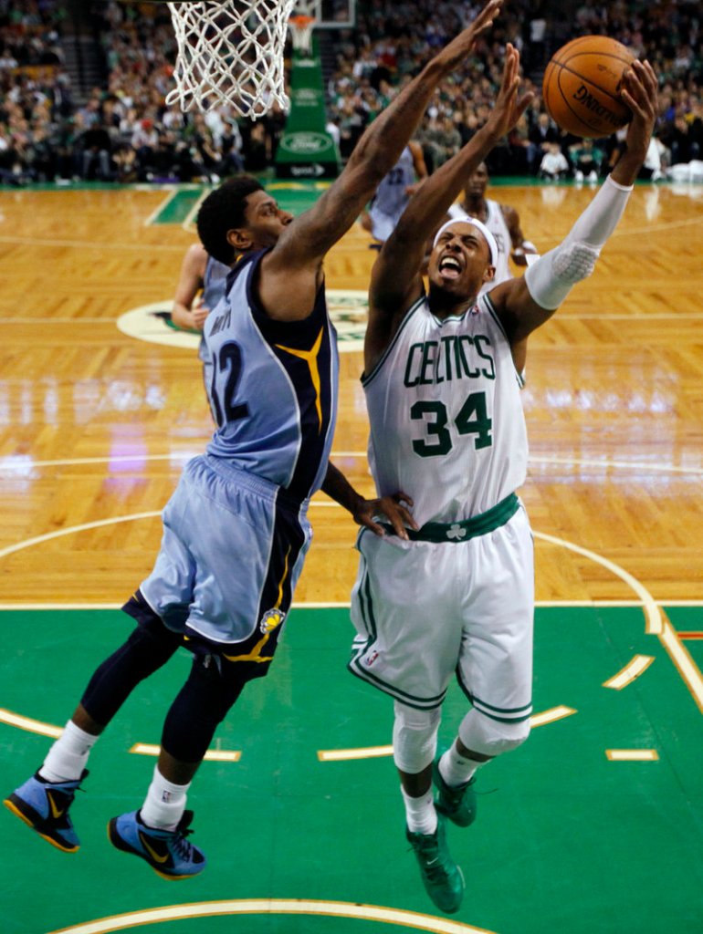 Paul Pierce goes up for a shot against O.J. Mayo of the Grizzlies during the Celtics’ 98-80 victory Sunday.
