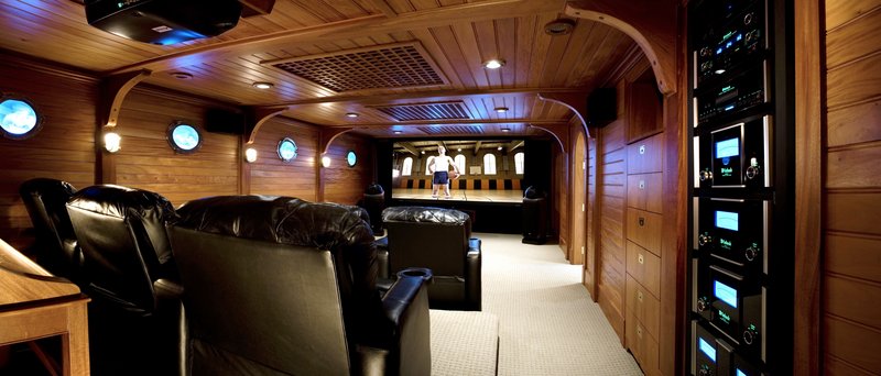 A wood-paneled home theater designed with a nautical theme boasts the latest in sound equipment as well as the comfort of easy chair seating. The Maine Home, Remodeling & Garden Show has a little bit of everything for people looking to improve their living spaces.