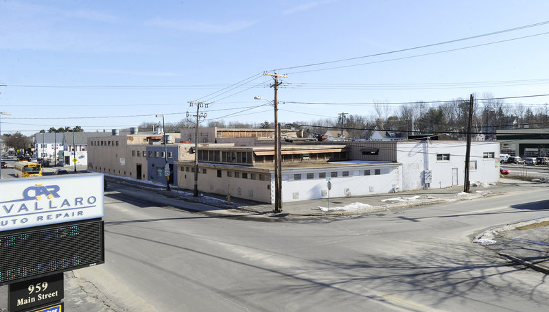 The city of Westbrook has hired an architect to design a building for the site of the former Maine Rubber Co. downtown. The city has been trying to redevelop the site for years.