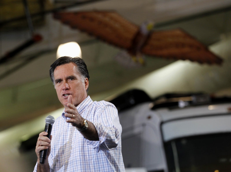 Republican presidential candidate Mitt Romney speaks at a campaign rally in Atlanta on Wednesday. He will be in Maine for a rally at 6 p.m. today.