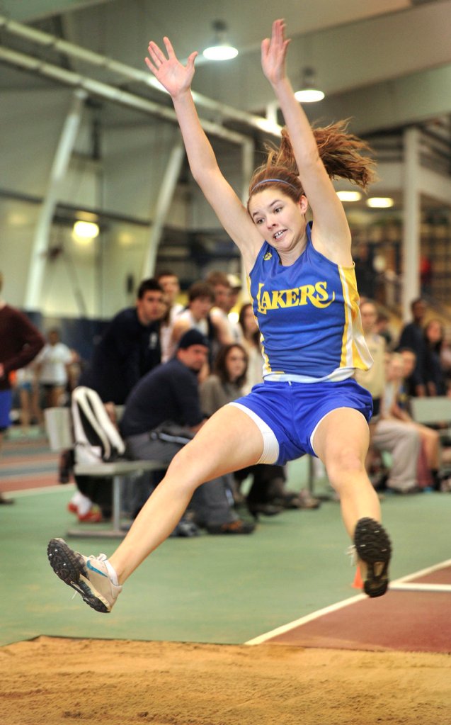 Kate Hall of Lake Region sets a meet record in the long jump – 17-5 1⁄4. Hall also won the junior 55 and junior 200.