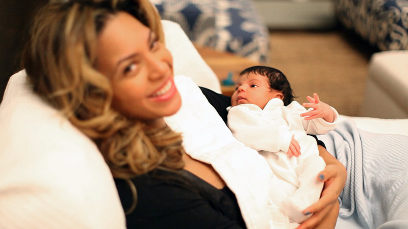 Beyonce Knowles holds her daughter, Blue Ivy, in a recent family photo. Five photos of the 1-month-old were posted by her parents. A hand-written note accompanying the photos reads: “We welcome you to share our joy.”