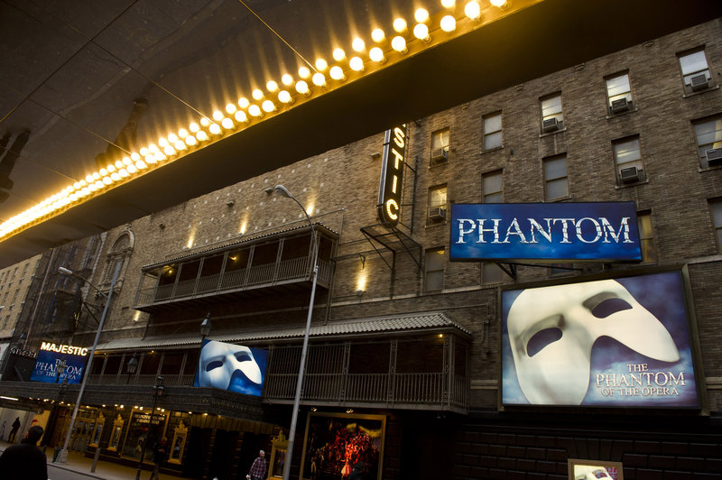 The Majestic Theatre, above, celebrated the 10,000th performance of "The Phantom of the Opera" with a giant cake and a curtain call.