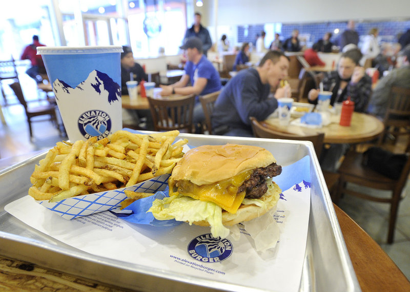 A cheeseburger, fries and a Coke at Elevation Burger in South Portland.