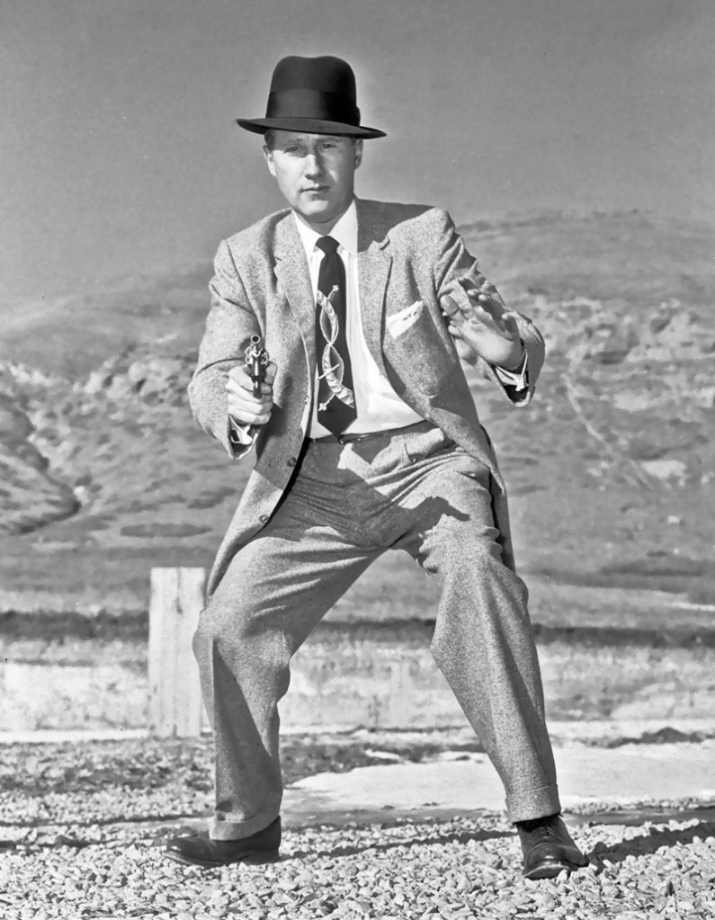 In this January 1958 picture, then-Salt Lake City FBI chief Mark Felt shows off his pistol skills. Breaking a silence of 30 years, Felt stepped forward in 2005 to admit he was Deep Throat, the secret source to The Washington Post who helped bring down President Nixon during the Watergate scandal. Felt, the former FBI second-in-command, died in December 2008. He was 95.