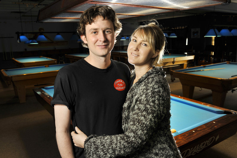 Gareth Steele and his wife, Jacqueline, hope their income from Sneaky Pete Billiards in Windham will help finance Steele’s career as a professional pool player.