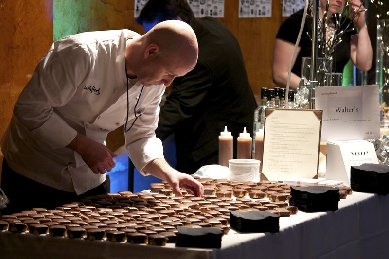 The staff of Walter’s readies the Portland restaurant’s display at the 2011 Signature Event.