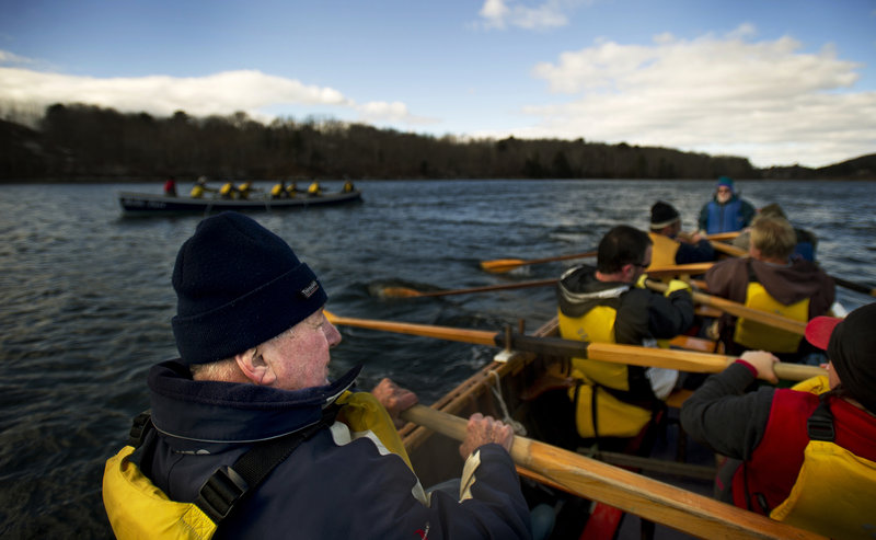 Malcolm Gater rows a 32-foot Cornish pilot gig with other members of Come Boating! earlier this month in Belfast Bay. The group will send two teams to compete in the Snow Row, a 3.75-mile race off Hull, Mass., on March 10.
