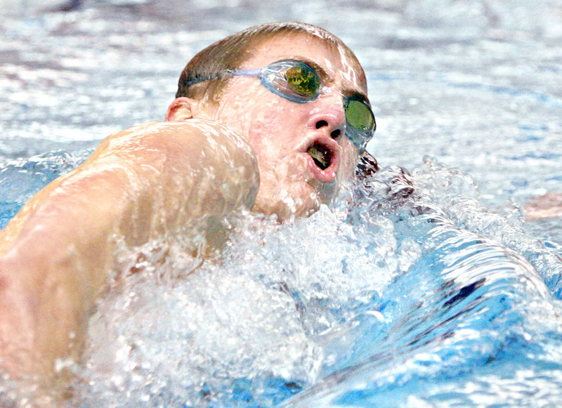 Jake Perron of Falmouth heads through the water while taking part in a 500-yard freestyle preliminary event. He qualified and went on to win the state title in the event with a time of 4 minutes, 56.3 seconds in the championship race.