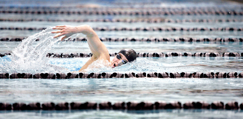 Luke Jeton of Waynflete competes in a 500-yard preliminary race of the Class B swimming and diving state championships at Bowdoin College in Brunswick. Jeton qualified, then finished second to Jake Perron of Falmouth in the finals. Greely captured the title team for the third consecutive season.