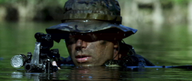 Navy SEALs in scenes from "Act of Valor." The SEALs' names do not appear in the film's credits.