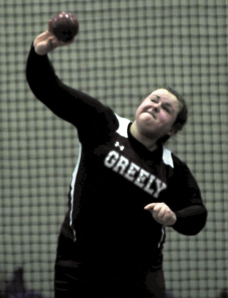 Catherine Fellows of Greely competes in the girls’ shot put during the Class B state meet in Lewiston. Her top throw of 33 feet, 4 1⁄2 inches was good enough to win the event.