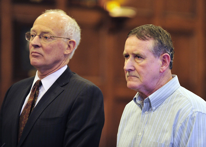 Accompanied by his attorney, Peter DeTroy, left, William Briggs, 61, of Windham pleads not guilty in court Thursday to a charge of manslaughter in connection with a hunting fatality in Sebago last year.