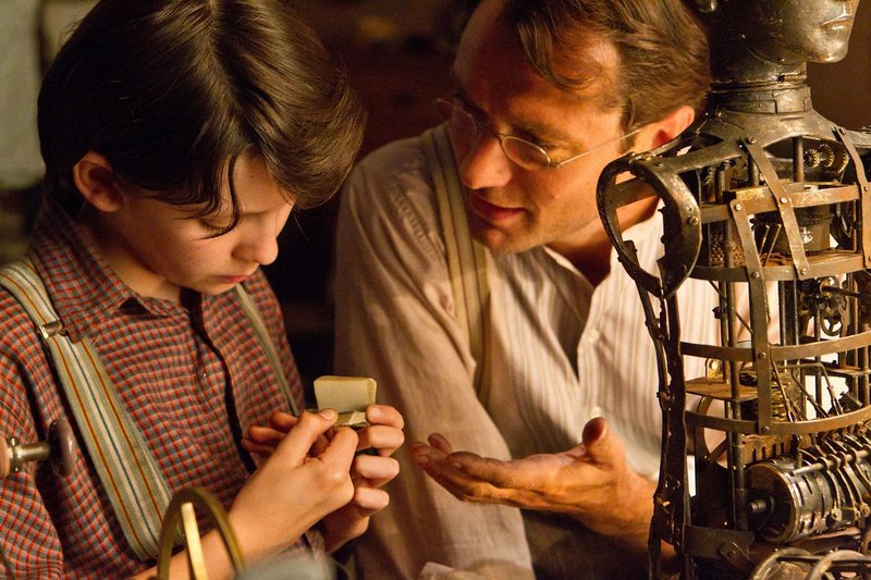 Asa Butterfield, left, and Jude Law, right, in a scene from Best Picture nominee "Hugo."