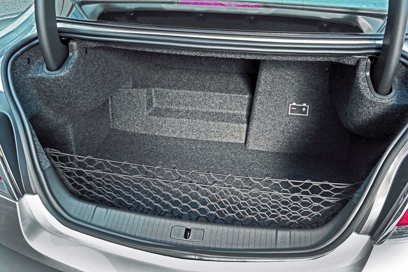 Although the stylish LaCrosse provides ample passenger room, cargo space is tight on models equipped with GM’s hybrid eAssist powertrain.