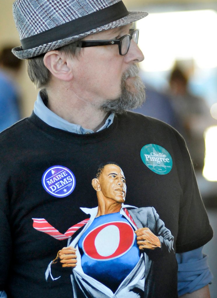 Robert O’Brien of Peaks Island sports an Obama T-shirt during Sunday’s caucus.