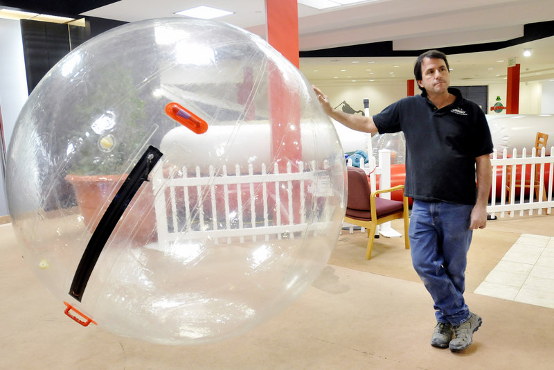 Owner Jeff Hunnewell says Summit Adventures at the Maine Mall took a lot of precautions to protect users of the “human hamster ball” from injury.