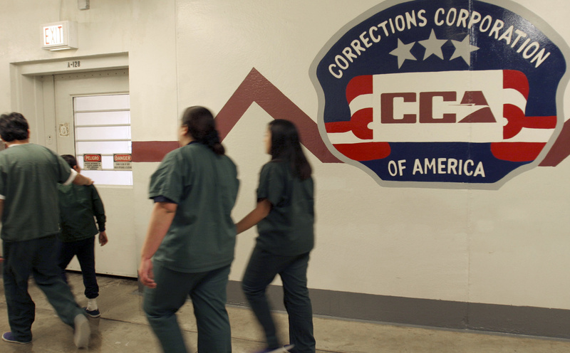 Immigrant detainees walk down a hall at the T. Don Hutto Residential Center, a Corrections Corporation of America facility in Taylor, Texas, in 2007. CCA wants to capitalize on the deal it made with the state of Ohio to buy the Lake Erie Correctional Institution, the first state prison to be bought by a private firm.