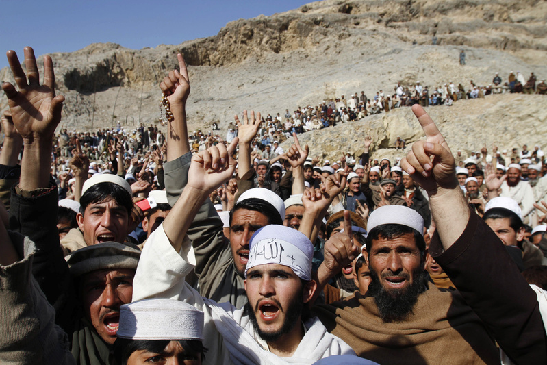 Afghans shout anti-American slogans during an anti-U.S. protest in Ghani Khail, east of Kabul, Afghanistan, over the burning of Qurans at a U.S. military base. The burning of Muslim holy books sent anti-Americanism soaring in a nation that has long distrusted foreigners.
