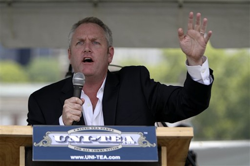 In this July 31, 2010 photo, conservative media publisher and activist Andrew Breitbart speaks to the audience at the "Uni-Tea" Tea Party rally at Independence Mall in Philadelphia. Breitbart died Thursday, March 1, 2012 in Los Angeles. He was 43. (AP Photo/Joseph Kaczmarek)