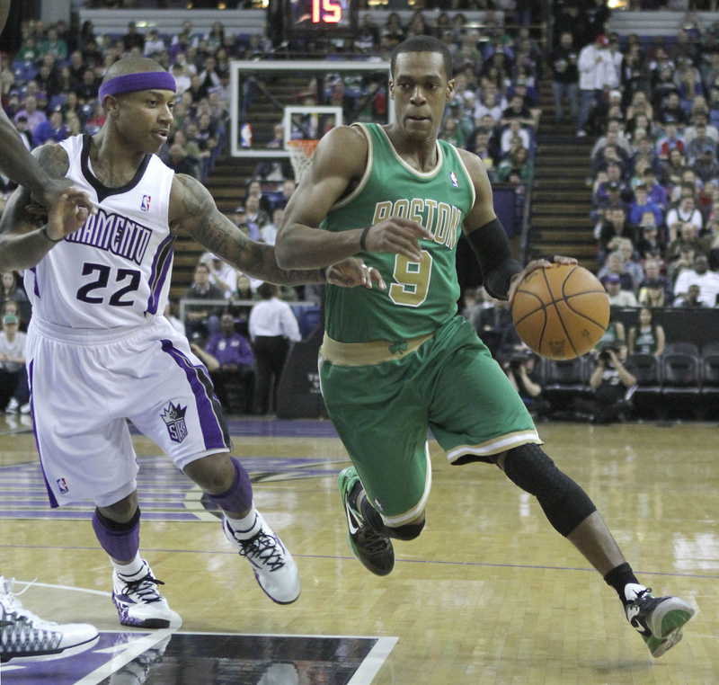 Boston Celtics guard Rajon Rondo drives against Sacramento Kings guard Isaiah Thomas during their game in Sacramento, Calif., Friday night. The Kings won, 120-95.
