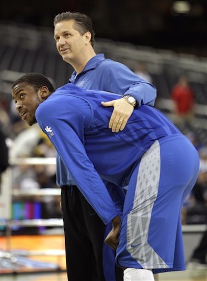 Kentucky head coach John Calipari stands with forward Michael Kidd-Gilchrist during a practice session for the NCAA Final Four basketball tournament Friday, March 30, 2012, in New Orleans. Kentucky plays Louisville in a semifinal game on Saturday. (AP Photo/Mark Humphrey)