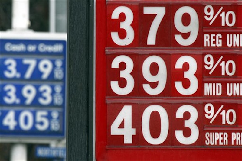 In this Friday, March 16, 2012 photo, a sign displays gas prices in Montpelier, Vt. A statistical analysis of 36 years of monthly inflation-adjusted gasoline prices and U.S. domestic oil production by The Associated Press shows no statistical correlation between how much oil comes out of U.S. wells and the price at the pump. (AP Photo/Toby Talbot)