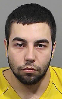 Arien L'Italien was accused of firing four shots from a handgun as members of the U.S. Marshals' Violent Offender Task Force tried to arrest him on Mellen Street on Jan. 27.