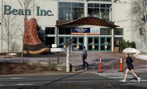 A jogger passes by the entrance to the L.L. Bean retail store in Freeport. (