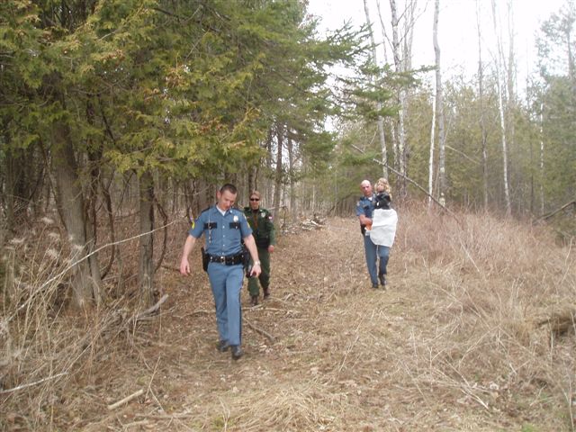 Searchers who found Morgan Lawler return her to her home this afternoon.