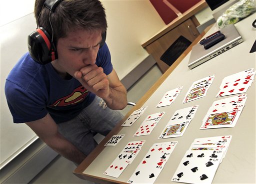 University of Pennsylvania sophomore Mike Mirski,19, wears sound dampening ear muffs as he practices his memory techniques ahead of Saturday's competition.
