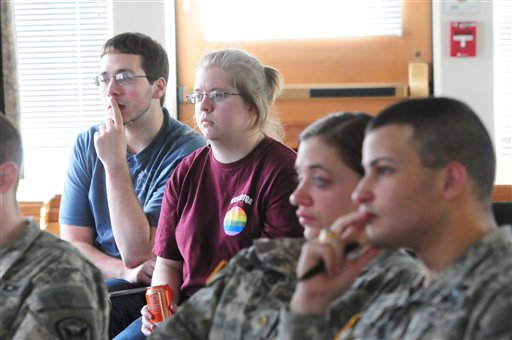Norwich University students, from left, Brian Loveless, 20, Hailey Libbey, 19, Mary Andreo, 22, and Joshua Fontanez, 22, attend a meeting of the Lesbian, Gay, Bisexual, Transgender, Questioning, and Allies Club on Monday.