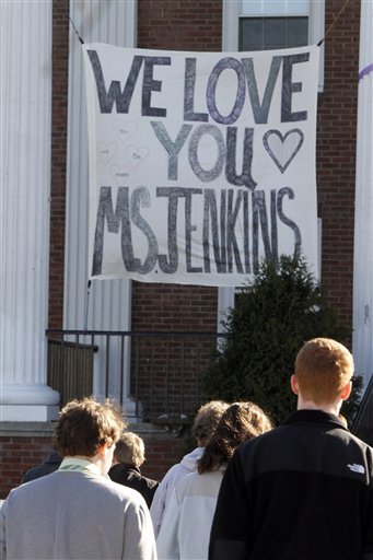 A banner hangs at St. Johnsbury Academy on Tuesday, March 27, 2012 in St. Johnsbury, Vt. The discovery of a body Monday believed to be that of Melissa Jenkins, a beloved teacher at the boarding school, sent shudders of grief and anxiety through the small New England town a day after her SUV was found running with her unharmed 2-year-old boy inside. Jenkins, a 33-year-old single mother, taught science at St. Johnsbury Academy. (AP Photo/Toby Talbot)