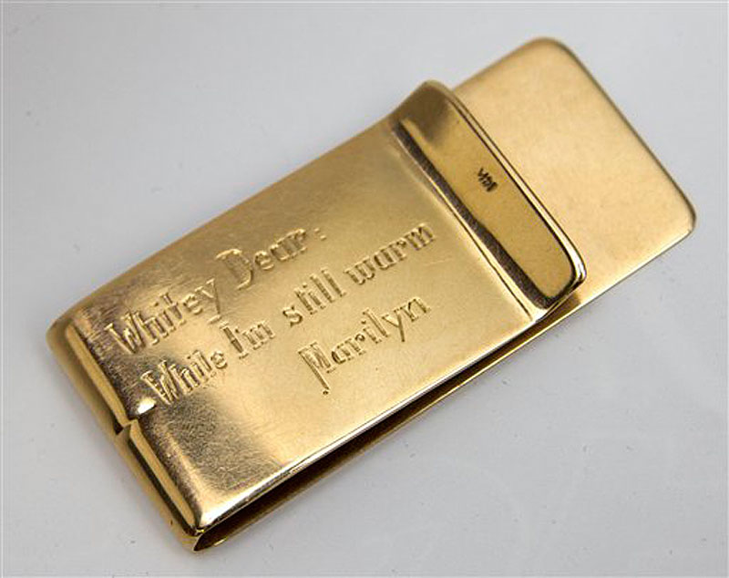 This undated image released by Julien's Auctions, shows a Tiffany Money Clip, stamped 14K gifted to Allan "Whitey" Snyder from Marilyn Monroe. This item is part of Julien's Auctions Hollywood Legends being held on Saturday, March 31, 2012 and Sunday April 1 in Beverly Hills, Calif. (AP Photo/Julien's Auctions)