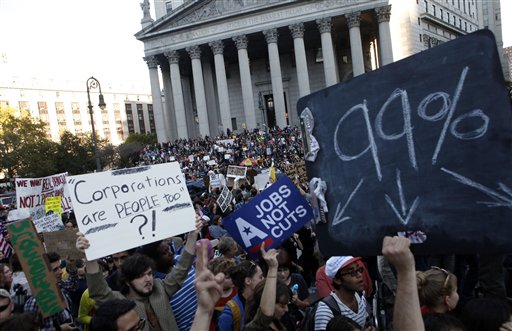 Occupy Wall Street protesters join a labor union rally in Foley Square before marching on Zuccotti Park in New York's Financial District in this Oct. 5, 2011, photo.