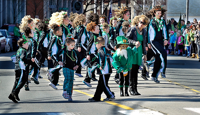 Members of the Stillson School of Irish Dance entertain the parade watchers during the Irish Parade on Commercial Street on Saturday, March 17, 2012.