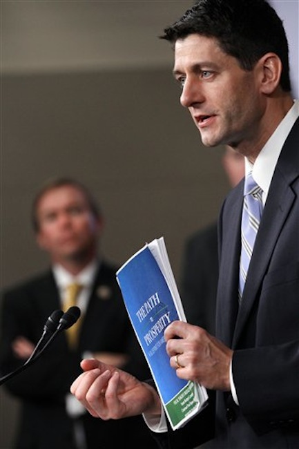 House Budget Committee Chairman Rep. Paul Ryan, R-Wis. holds a copy of his budget plan entitled "The Path to Prosperity," Tuesday, March 20, 2012, during a news conference on Capitol Hill in Washington. (AP Photo/Jacquelyn Martin)