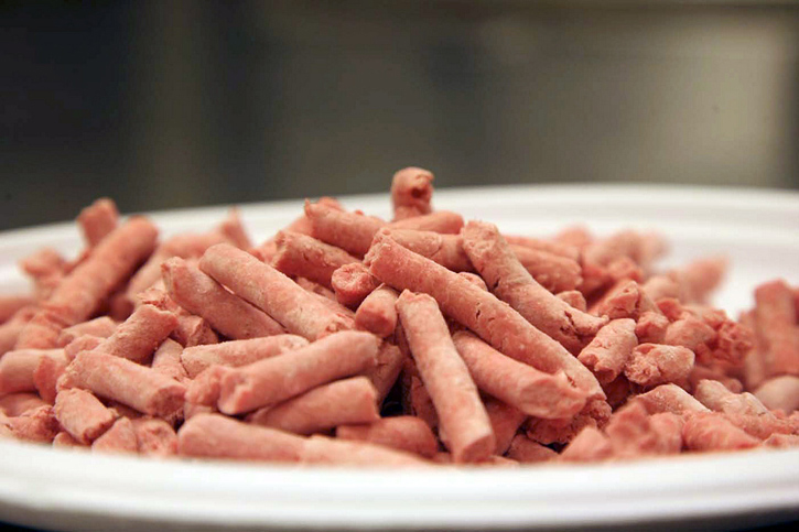 An undated image from Beef Products Inc. shows processed trimmings cleansed with ammonia that are commonly mixed into ground meat.