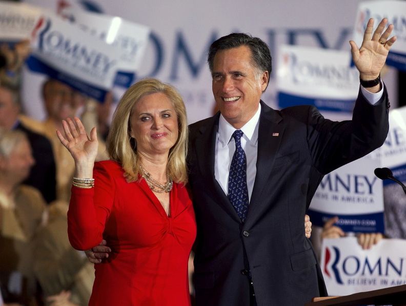 Republican presidential candidate, former Massachusetts Gov. Mitt Romney and his wife Ann wave to a crowd during a election night rally in Schaumburg, Ill., tonight.