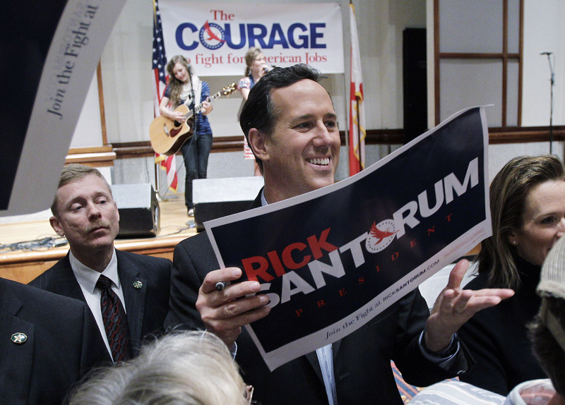 Republican presidential candidate, former Pennsylvania Sen. Rick Santorum visits with supporters during a rally Monday in Montgomery, Ala. He was polling well in Alabama's GOP primary tonight.