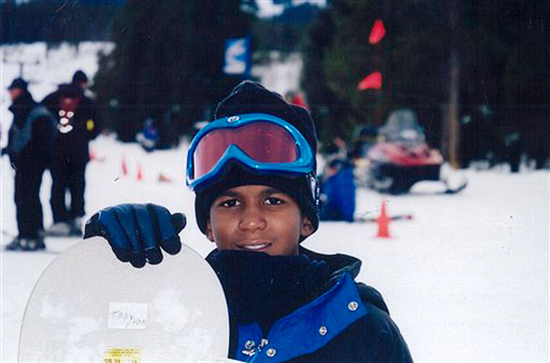 This undated file photo provided by the Martin family, shows Trayvon Martin snowboarding. Martin was slain in the town of Sanford, Fla., on Feb. 26 in a shooting that has set off a nationwide furor over race and justice. Neighborhood crime-watch captain George Zimmerman claimed self-defense and has not been arrested, though state and federal authorities are still investigating. Since the slaying, a portrait has emerged of Martin as a laid-back young man who loved sports, was extremely close to his father, liked to crack jokes with friends and, according to a lawyer for his family, had never been in trouble with the law. (AP Photo/Martin Family, File)