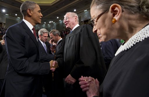 President Barack Obama greets Supreme Court Justice Anthony Kennedy and Ruth Bader Ginsburg, right, prior to his State of the Union address In this Jan. 24, 2012, photo.