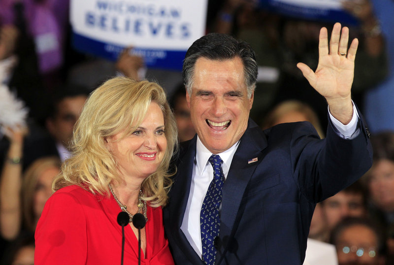 Former Massachusetts Gov. Mitt Romney and his wife Ann greet supporters Tuesday in Novi, Mich. After winning in Michigan, he looks to Ohio and other primaries next Tuesday.