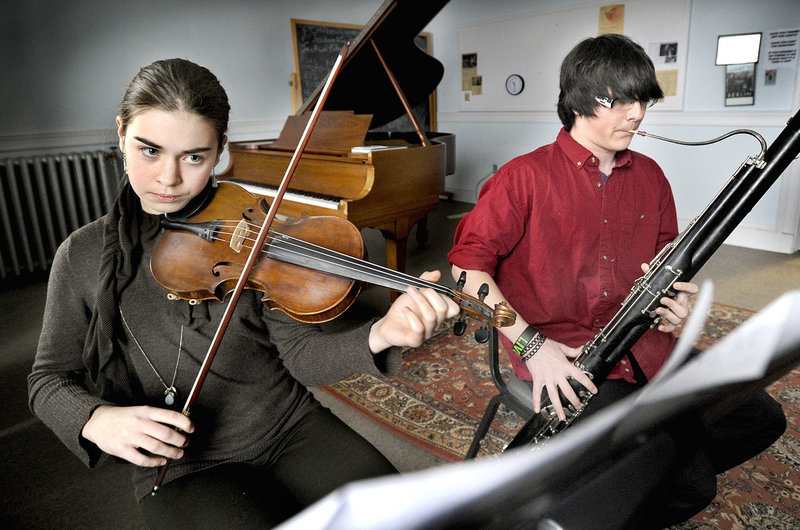 Elise LeBihan, violin, and Devin Adams, bassoon, rehearse during a recent Saturday session at the conservatory.