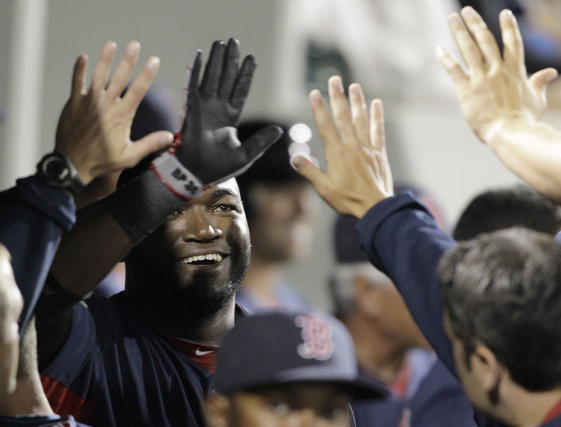 David Ortiz is all smiles, as usual, after hitting a home run in Monday’s night’s exhibition game with the Twins at Fort Myers, Fla. The Sox won 10-2 as Clay Buchholz pitched two hitless innings.