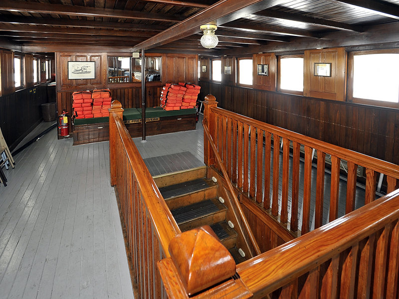 A wooden stairway leads from the Sitting Room to the lower deck. Ninety trips and two dozen charters are scheduled for the boat this coming season.